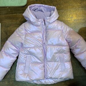 Girls size 7/8 Swiss Tech Puffer Coat purple in color.